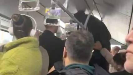 Metrobüste boş koltuk kavgası! Aracın tutunma demirine tırmanarak yumruk attı