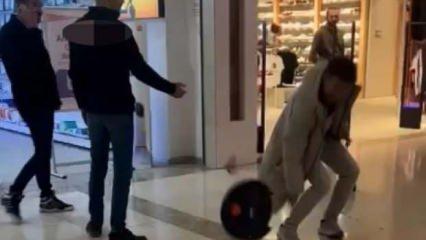 Tüketici isyan etti: Sık sık bozulan süpürgeyi mağazanın önünde parçaladı