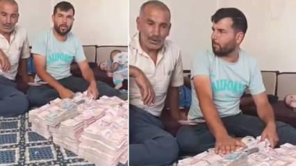 Önüne balya balya para koyan besiciden sosyal medyayı karıştıran iddia