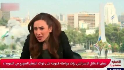 Şam'ın bombalanma anı kamerada: Sunucu bombanın etkisiyle yere düştü!