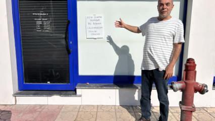 Sıcaklardan bunalan adamın iş yerine astığı not güldürdü!