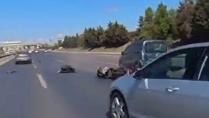 Arnavutköy'de motosikletli, araç altında kalmaktan son anda kurtuldu