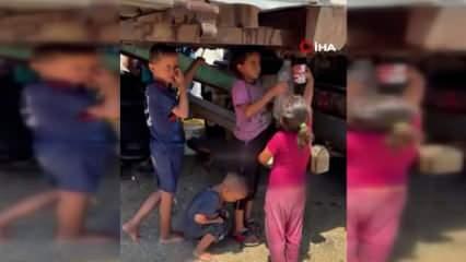 Gazzeli çocukların kirli suyu kaplarına doldurdukları o anlar yürekleri yaktı
