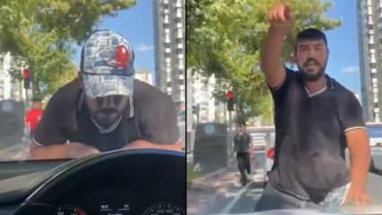 Cam silme bahanesiyle aracın kaputuna yatıp zorla para istemişti, tutuklandı