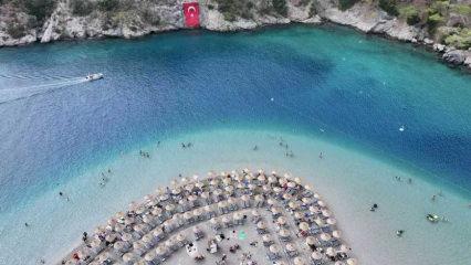 Muğla’da yaz bitmiyor: Yamaç paraşütü ve plaj keyfine devam!