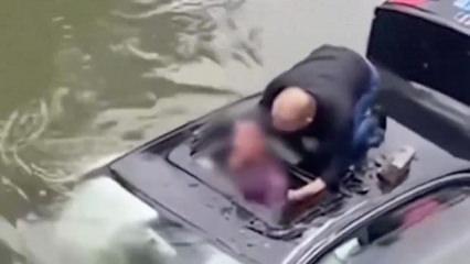 Hayat kurtaran cesaret: Çin'de nehre düşen sürücüyü 40 yaşındaki kahraman kurtardı