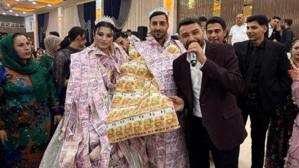 Düğünde gelin ve damada paradan yelek giydirip, taç taktılar