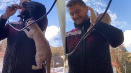 Gülümseten anlar: Yavru kedi, ezan okuyan imamın üstüne tırmandı