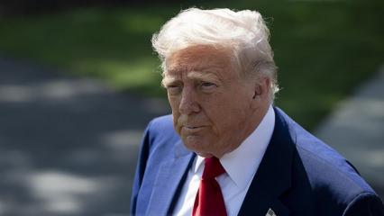 Beyaz Saray'da dikkat &ccedil;eken kare: Trump hemen okumaya başladı