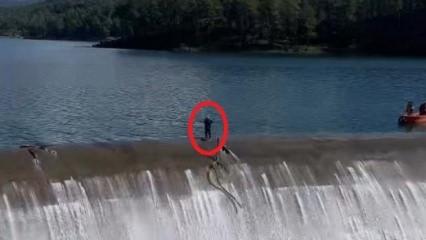 Antalya'da a&ccedil;ık barajda y&uuml;rekleri ağza getiren temizlik &ccedil;alışması! O anlar kamerada 