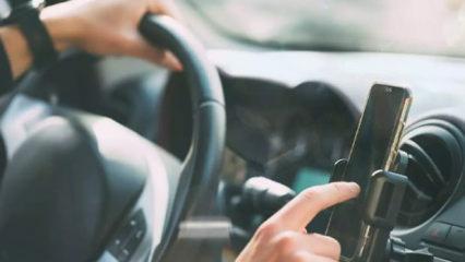 Otomobillerde telefon tutucular yasaklandı mı? Milyonları ilgilendiren a&ccedil;ıklama