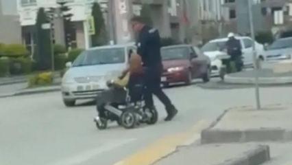Osmaniye'de polis memurundan ak&uuml;l&uuml; sandalyedeki kadına y&uuml;rek ısıtan yardım