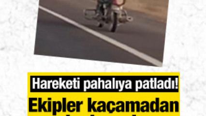 Motosiklet &uuml;zerindeki akrobatik harekete rekor ceza!