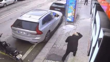 R&uuml;zgarda patlayan camın par&ccedil;aları başına d&uuml;şt&uuml;; o anlar kamerada