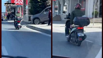 E-5&rsquo;te skandal g&ouml;r&uuml;nt&uuml;: Bebeği motosiklete lastikle bağlayıp trafiğe &ccedil;ıktı