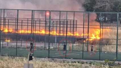 Yangın devam ederken futbol oynadılar! Bilin&ccedil;sizlik kamerada