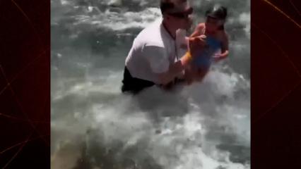 K&uuml;&ccedil;&uuml;k kız akıntıya kapıldı: Rus turist kızı işte b&ouml;yle kurtardı