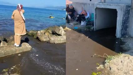 Kanalizasyon suyu sahilde vatandaşların &uuml;zerine aktı