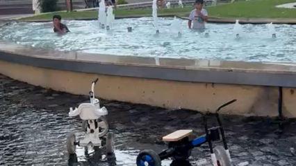 Bolu'da &ouml;l&uuml;me meydan okuyan serinlik! Elektrik tehlikesine rağmen suya atladılar