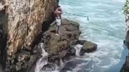 Denize girme yasağını dinlemedi, kayalıklarda mahsur kaldı