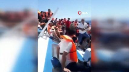 Girne a&ccedil;ıklarında alabora olan gemideki yolcuları kurtarma &ccedil;alışmaları kameralara yansıdı