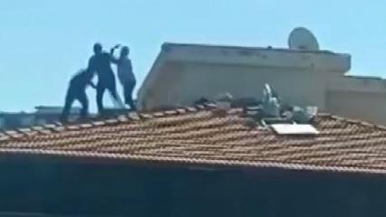 Gaziantep'te bina &ccedil;atısında y&uuml;rekleri ağza getiren kavga