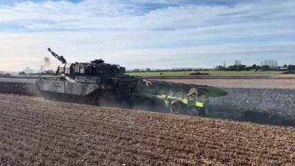 Tarlayı tank ile s&uuml;rd&uuml;, sosyal medya yıkıldı!