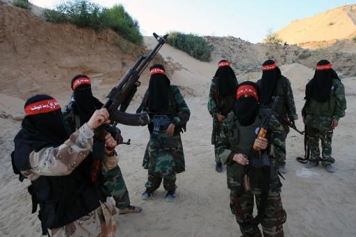 Filistin Kurtuluşu Demokratik Cephesi DFLP Mensubu kadın militanlar, Gazze Şeridi'nin güneyinde talim yaptı.