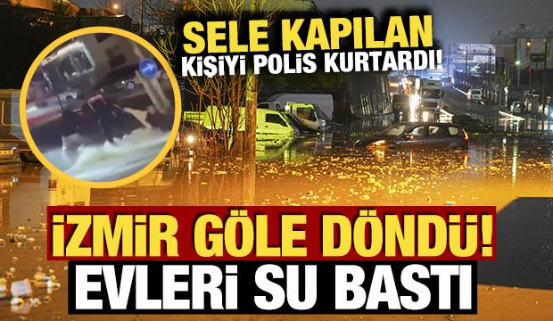 İzmir g&ouml;le d&ouml;nd&uuml;: Evleri su bastı! Sele kapılan kişiyi polis kurtardı