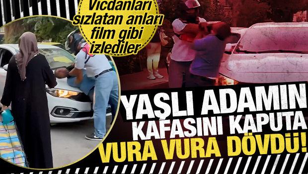 Antalya'da yaşlı adamın kafasını kaputa vura vura d&ouml;vd&uuml;, millet ise izlemekle yetindi!